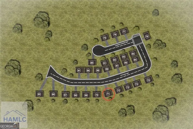 a front view of a house with a yard table and chairs