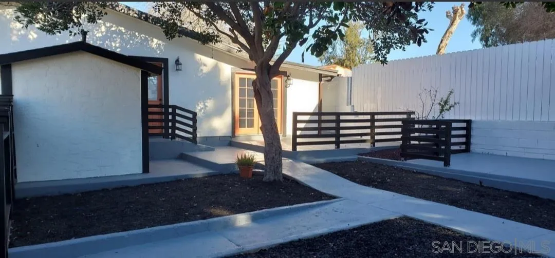 2743-2745 Ridgeway Drive National City, CA 91950 - Photo 20 of 35 a view of outdoor space with deck and tree