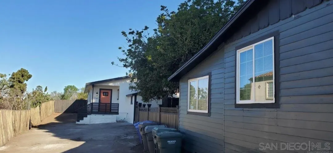 2743-2745 Ridgeway Drive National City, CA 91950 - Photo 2 of 35 a front view of a house with garden