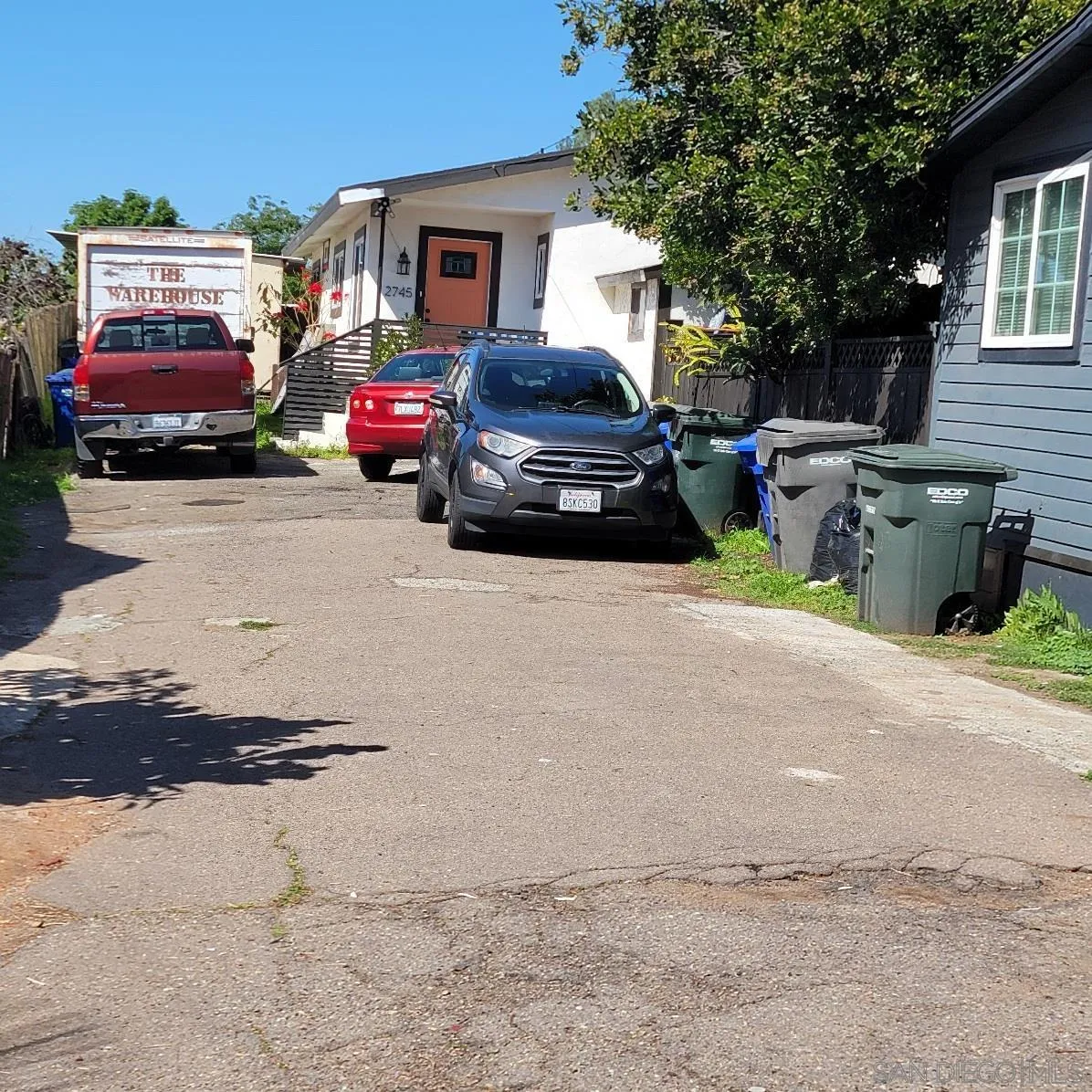 2743-2745 Ridgeway Drive National City, CA 91950 - Photo 4 of 35 a car parked in front of a house