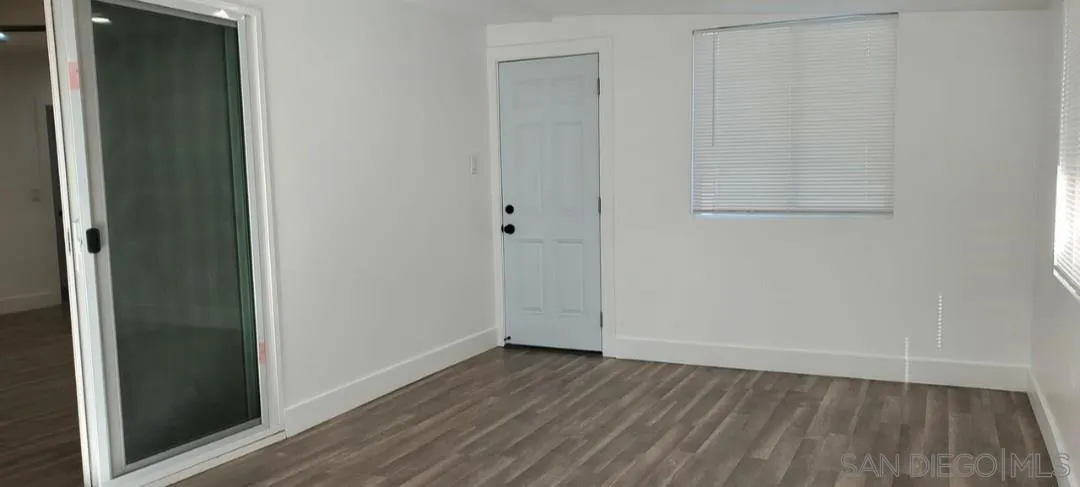 2743-2745 Ridgeway Drive National City, CA 91950 - Photo 8 of 35 a view of a small space with wooden floor and closet