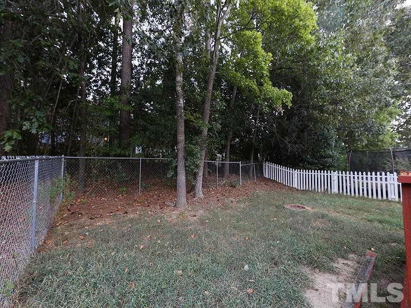 6108 New Market Way Raleigh, NC 27609 - Photo 16 of 17 a view of a fence