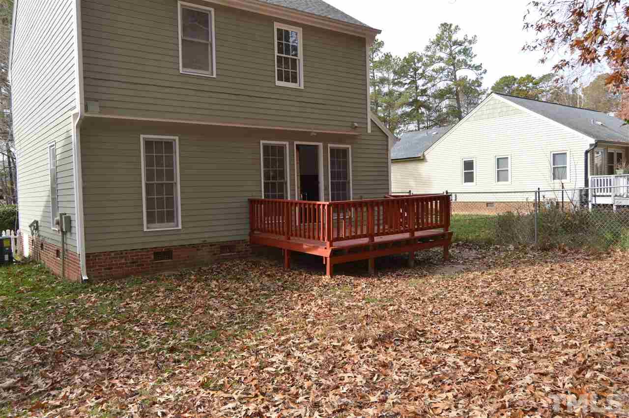 6108 New Market Way Raleigh, NC 27609 - Photo 17 of 17 front view of a house with a yard