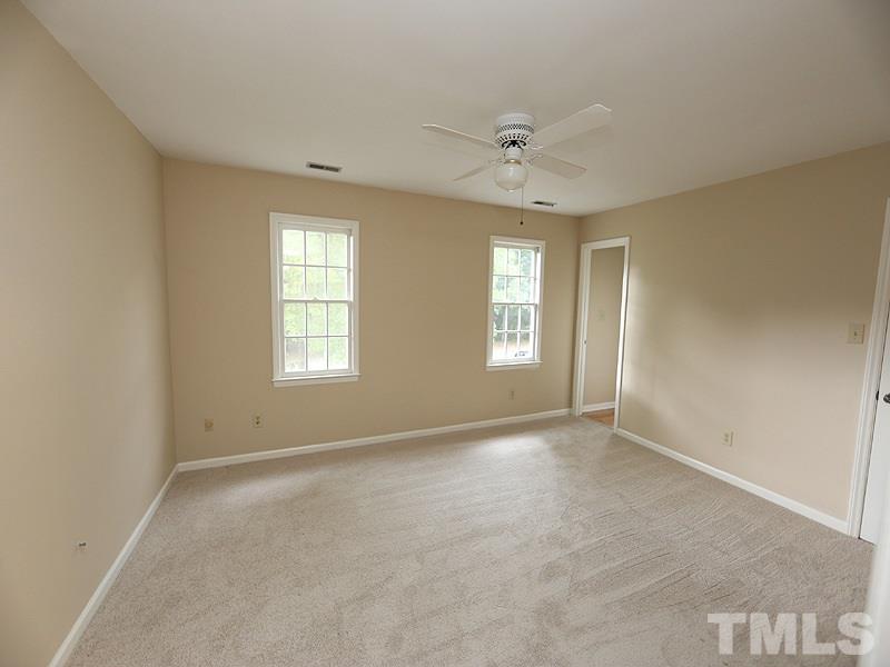 6108 New Market Way Raleigh, NC 27609 - Photo 9 of 17 a view of an empty room with a window