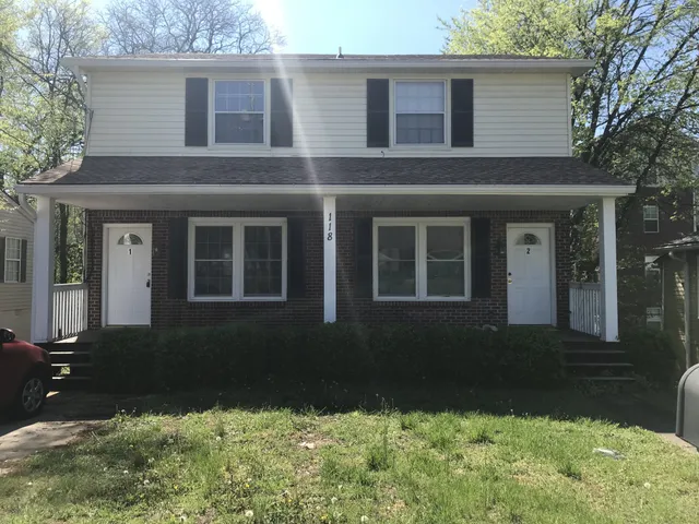 a house view with a garden space