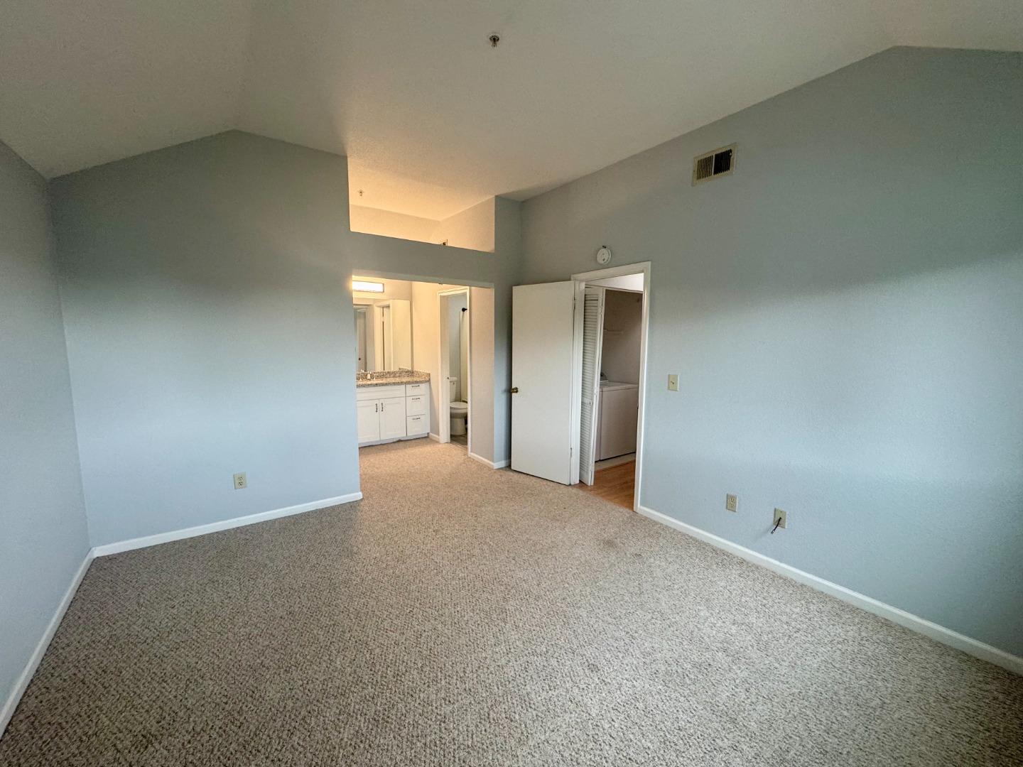 741 Pointe Pacific Drive, Unit 10 Daly City, CA 94014 - Photo 13 of 24 a view of an empty room with a window