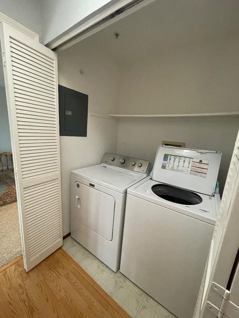 741 Pointe Pacific Drive, Unit 10 Daly City, CA 94014 - Photo 21 of 24 a utility room with dryer and washer
