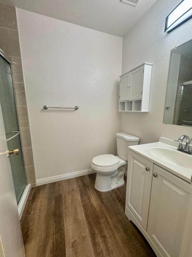 741 Pointe Pacific Drive, Unit 10 Daly City, CA 94014 - Photo 8 of 24 a bathroom with a sink and a toilet