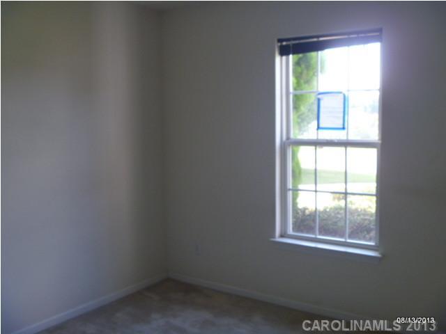 2214 Dawn Ridge, Unit 50 Monroe, NC 28110 - Photo 13 of 16 an empty room with a window