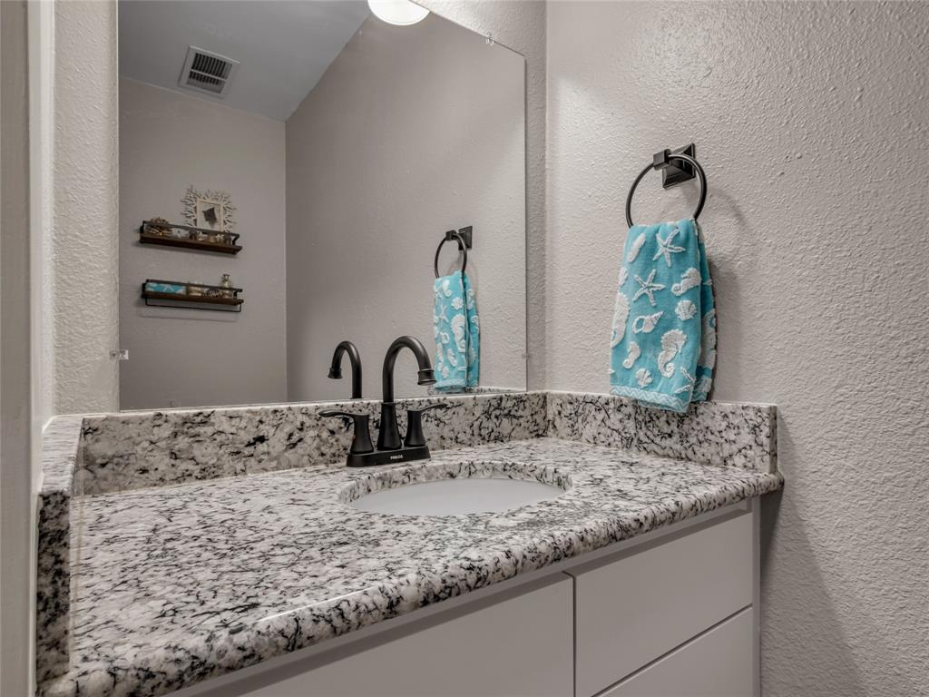 5200 Martel Avenue, Unit 27B Dallas, TX 75206 - Photo 17 of 33 Half Bath Level 1