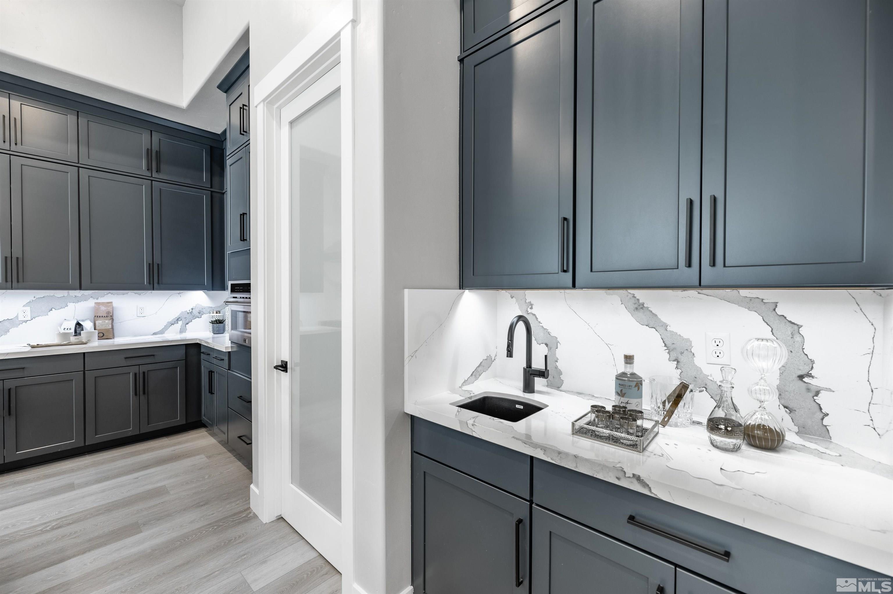 1592 River Hill Way, Unit HOMESITE 16 Reno, NV 89523 - Photo 14 of 35 a kitchen with a sink and cabinets