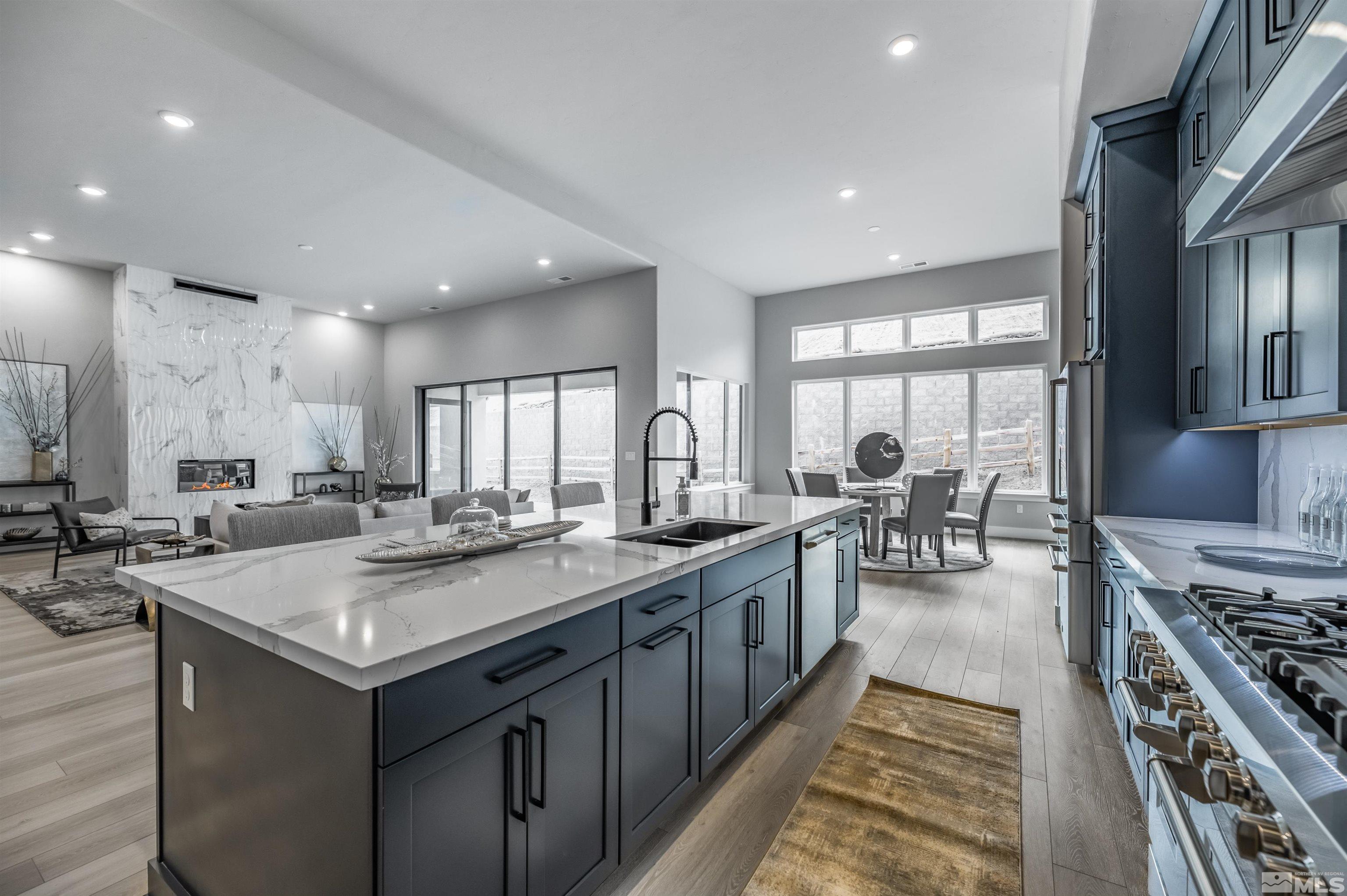 1592 River Hill Way, Unit HOMESITE 16 Reno, NV 89523 - Photo 17 of 35 a kitchen with sink stove and cabinets