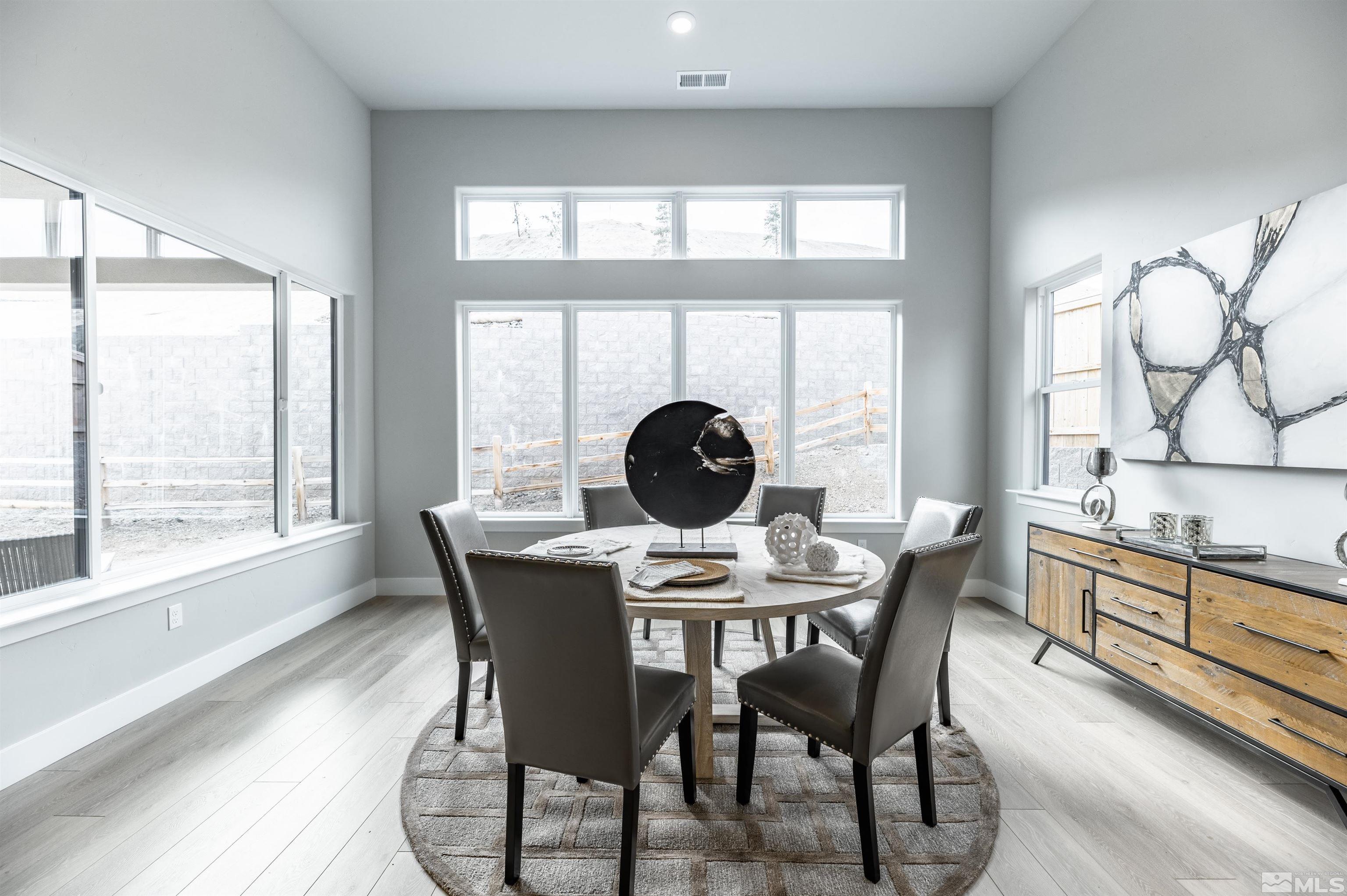 1592 River Hill Way, Unit HOMESITE 16 Reno, NV 89523 - Photo 19 of 35 a view of a dining room with furniture and window