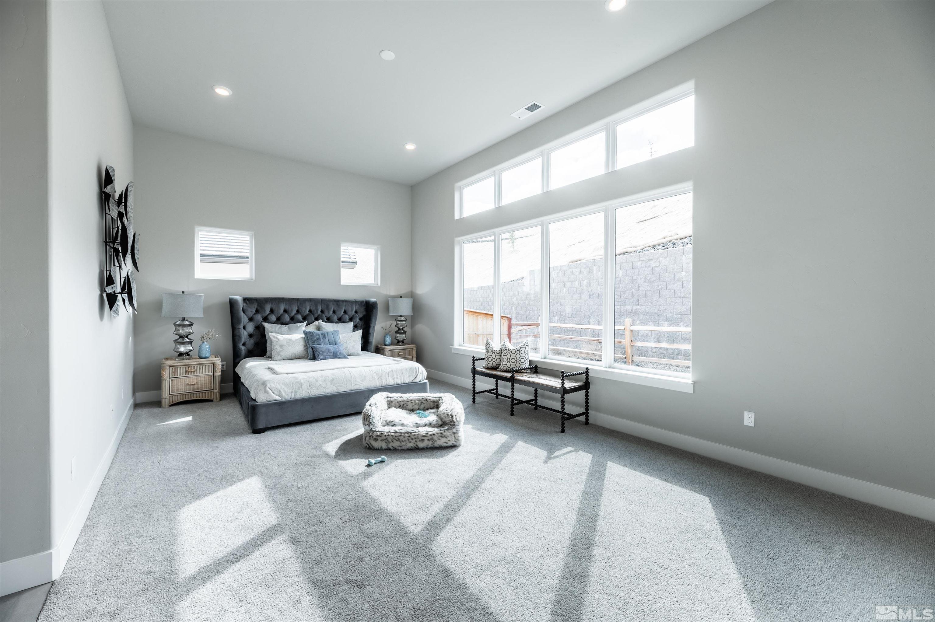 1592 River Hill Way, Unit HOMESITE 16 Reno, NV 89523 - Photo 20 of 35 a living room with furniture and a large window