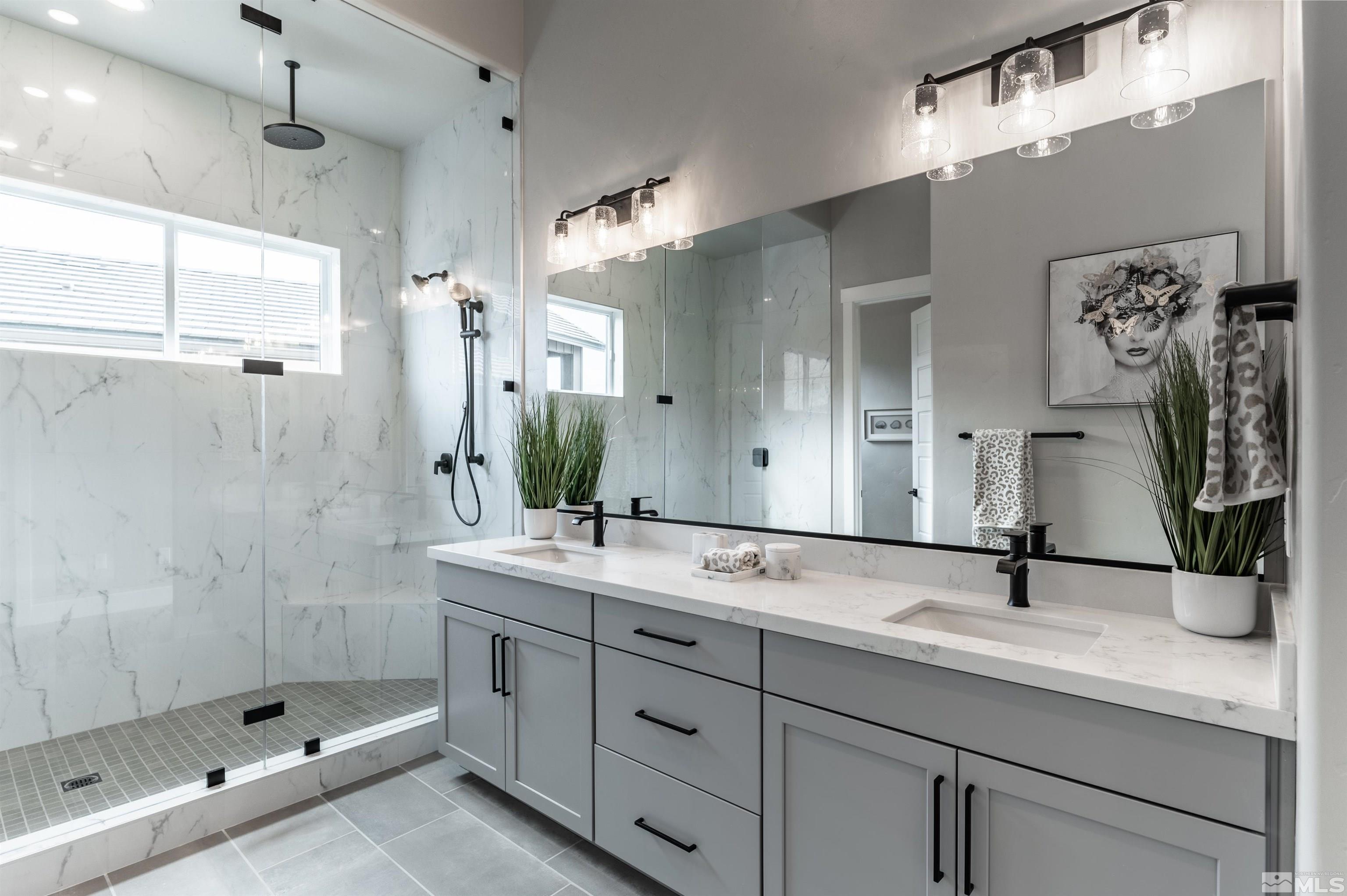 1592 River Hill Way, Unit HOMESITE 16 Reno, NV 89523 - Photo 21 of 35 a bathroom with a shower sink and mirror
