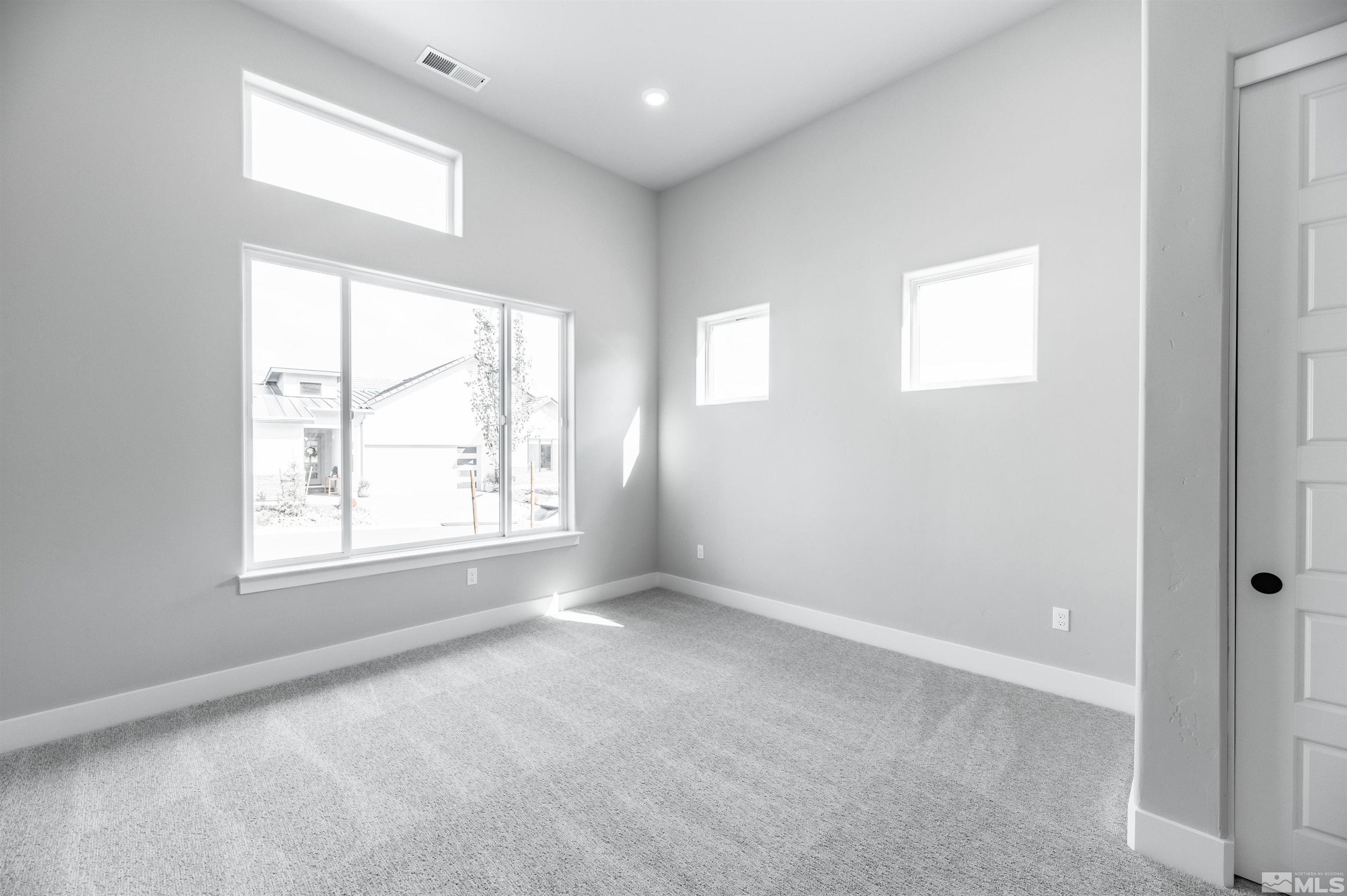 1592 River Hill Way, Unit HOMESITE 16 Reno, NV 89523 - Photo 26 of 35 an empty room with windows