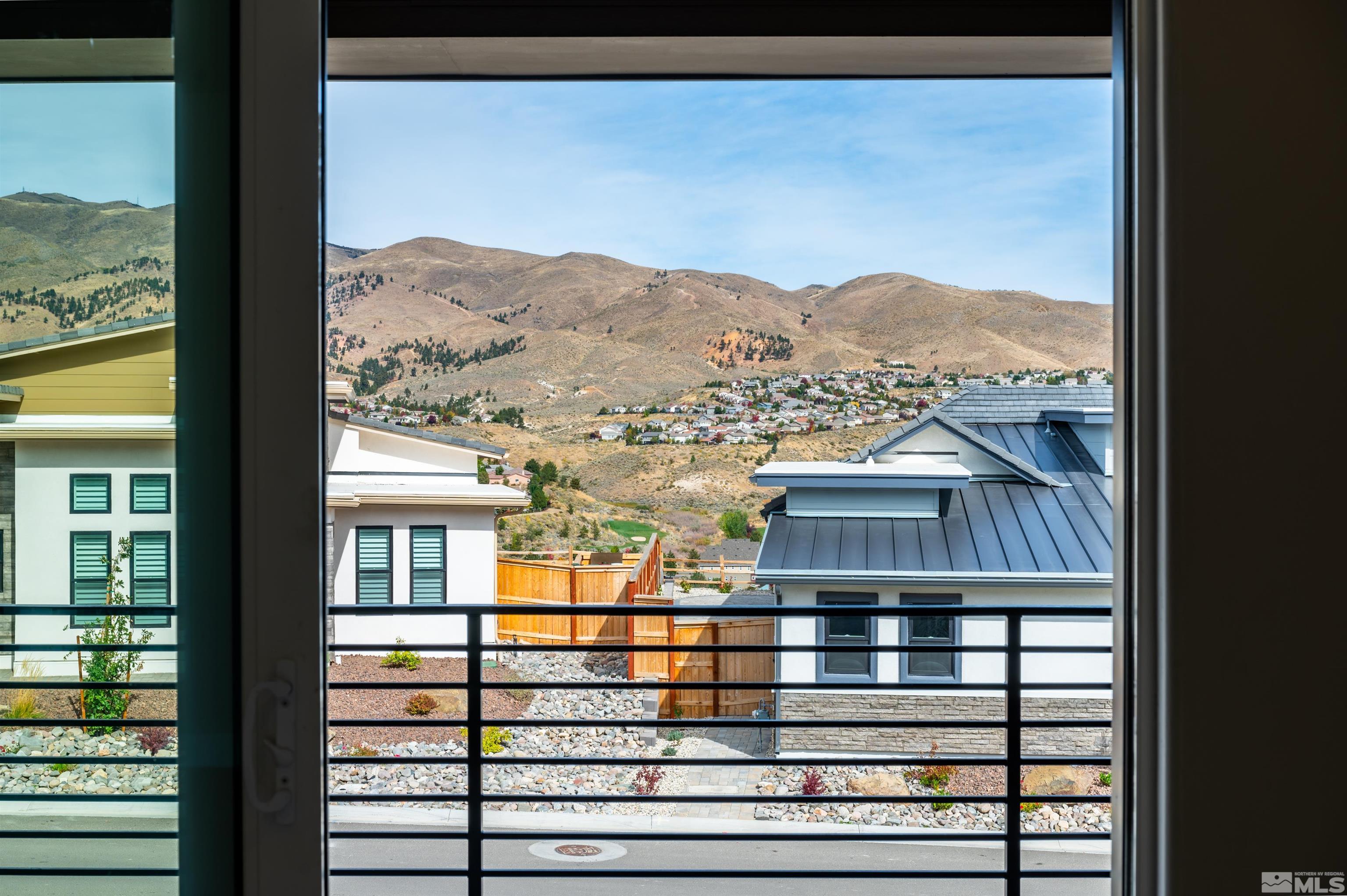 1592 River Hill Way, Unit HOMESITE 16 Reno, NV 89523 - Photo 31 of 35 a view of a balcony with an ocean view