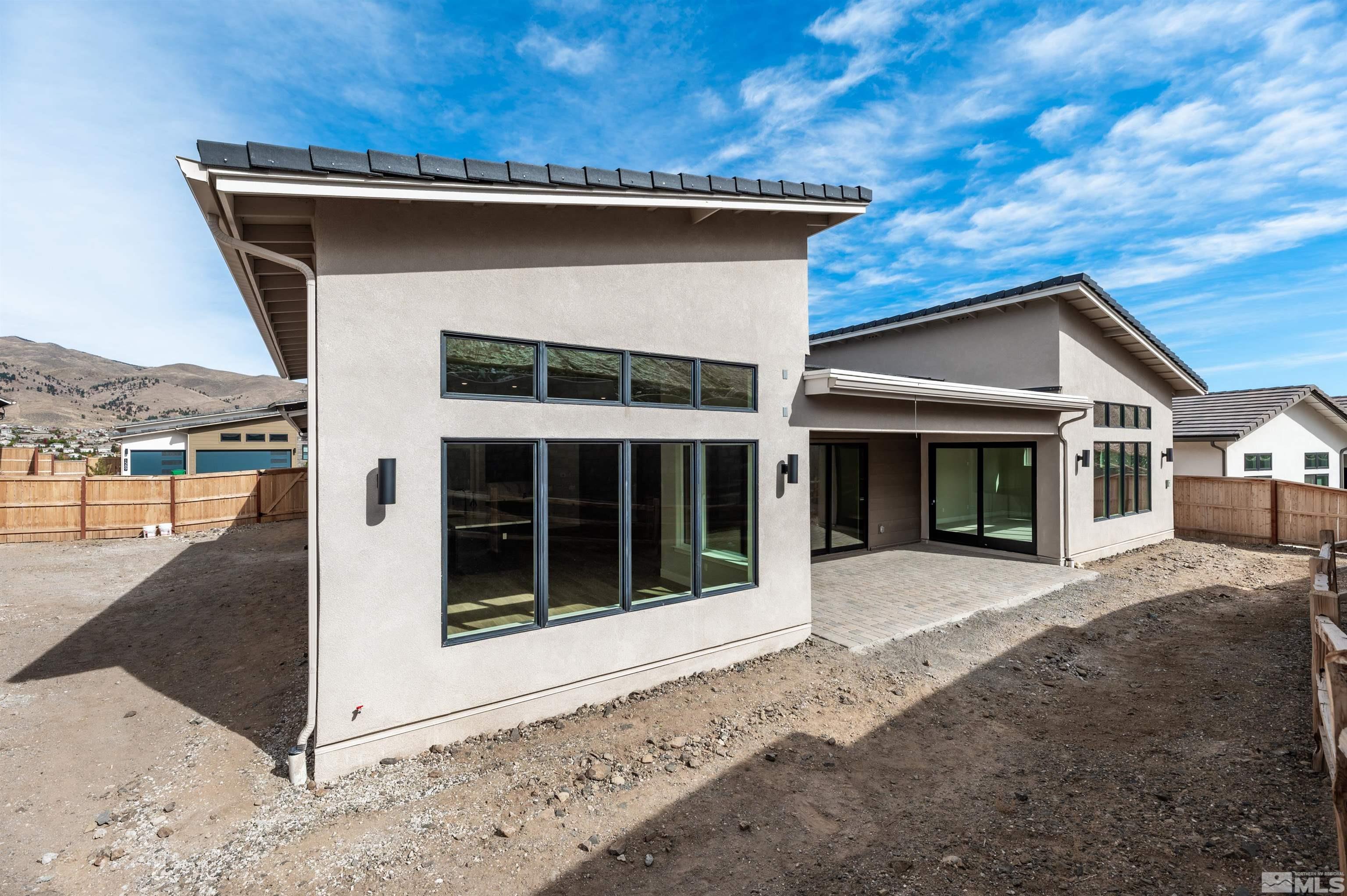 1592 River Hill Way, Unit HOMESITE 16 Reno, NV 89523 - Photo 34 of 35 a view of a house with a yard