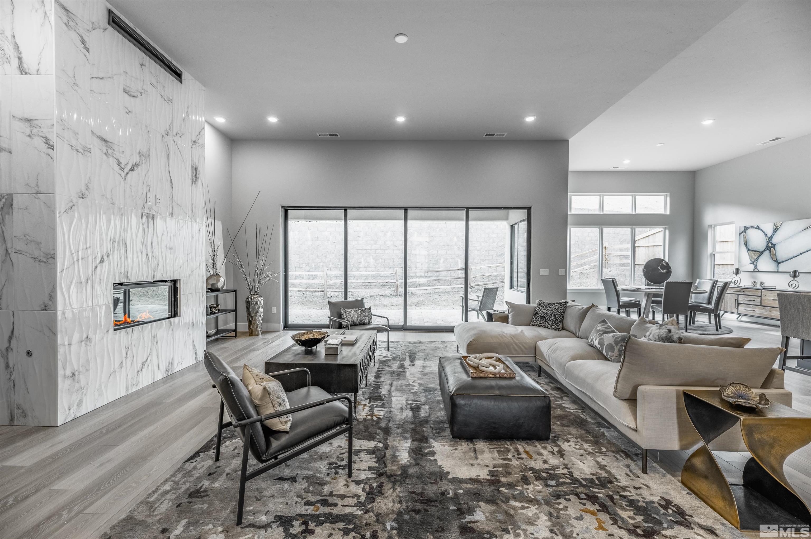 1592 River Hill Way, Unit HOMESITE 16 Reno, NV 89523 - Photo 7 of 35 a living room with furniture and a large window