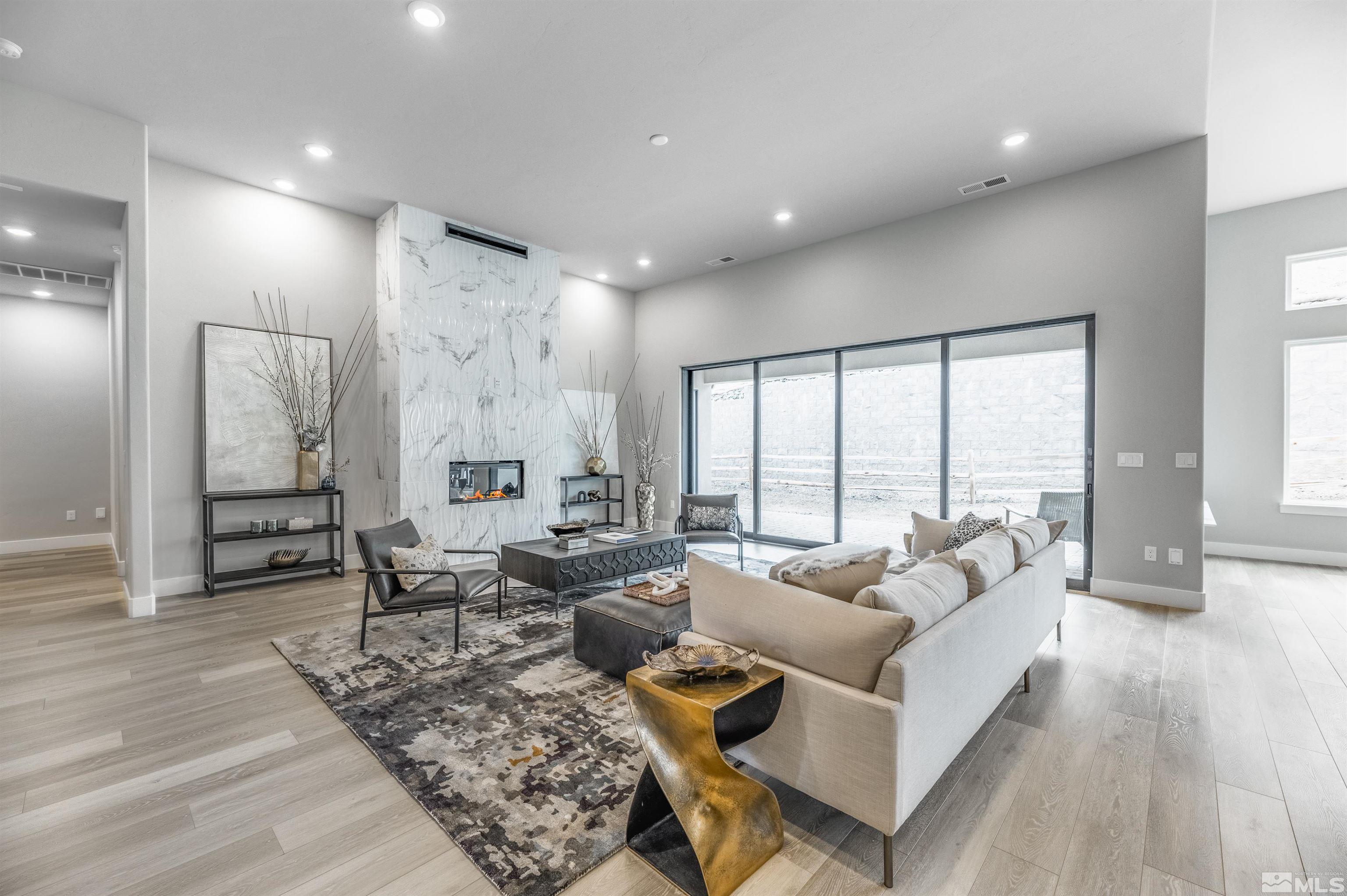 1592 River Hill Way, Unit HOMESITE 16 Reno, NV 89523 - Photo 8 of 35 a living room with furniture wooden floor and a large window