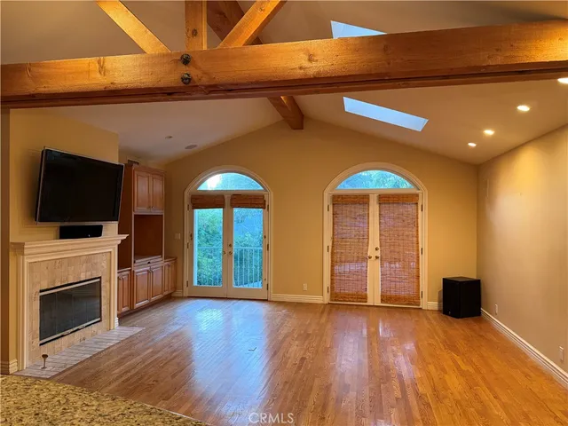 a view of livingroom with furniture and a flat screen tv
