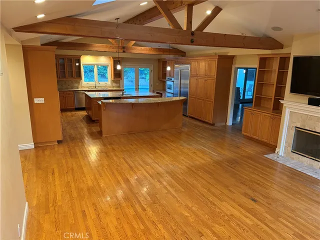 a view of a kitchen with a sink