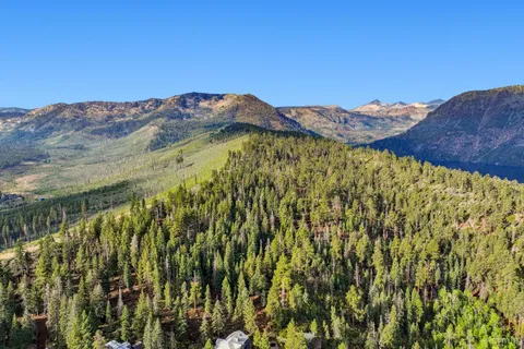 a view of a city with a mountain in the background