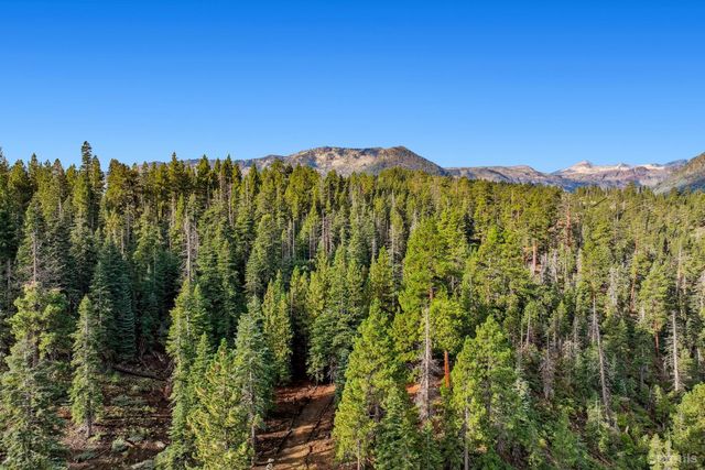 a view of a lake with a mountain in the background