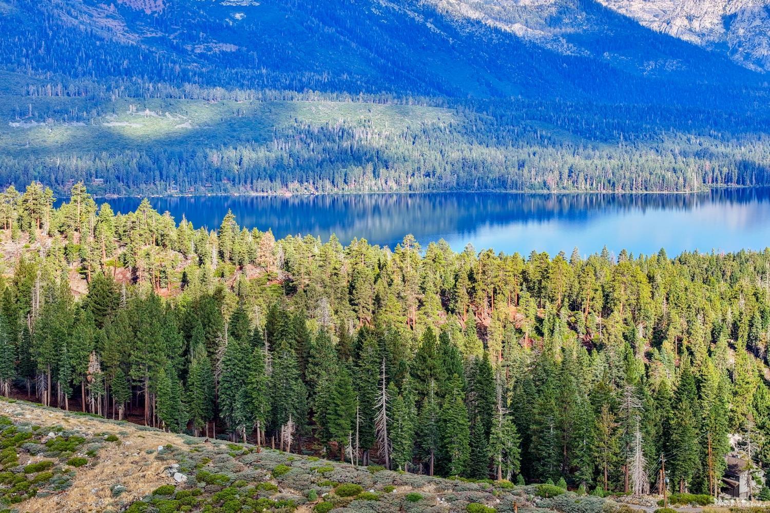 350 Glenmore Way South Lake Tahoe, CA 96150 - Photo 26 of 37 a view of a lake with a mountain in the background