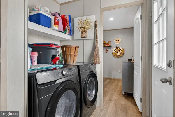 a utility room with dryer and washer