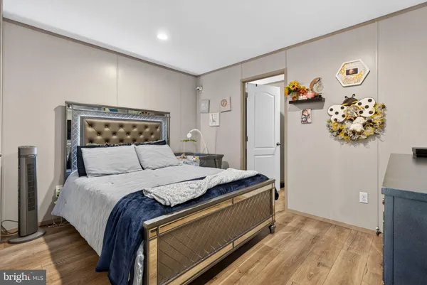a bed room with a bed and a couch
