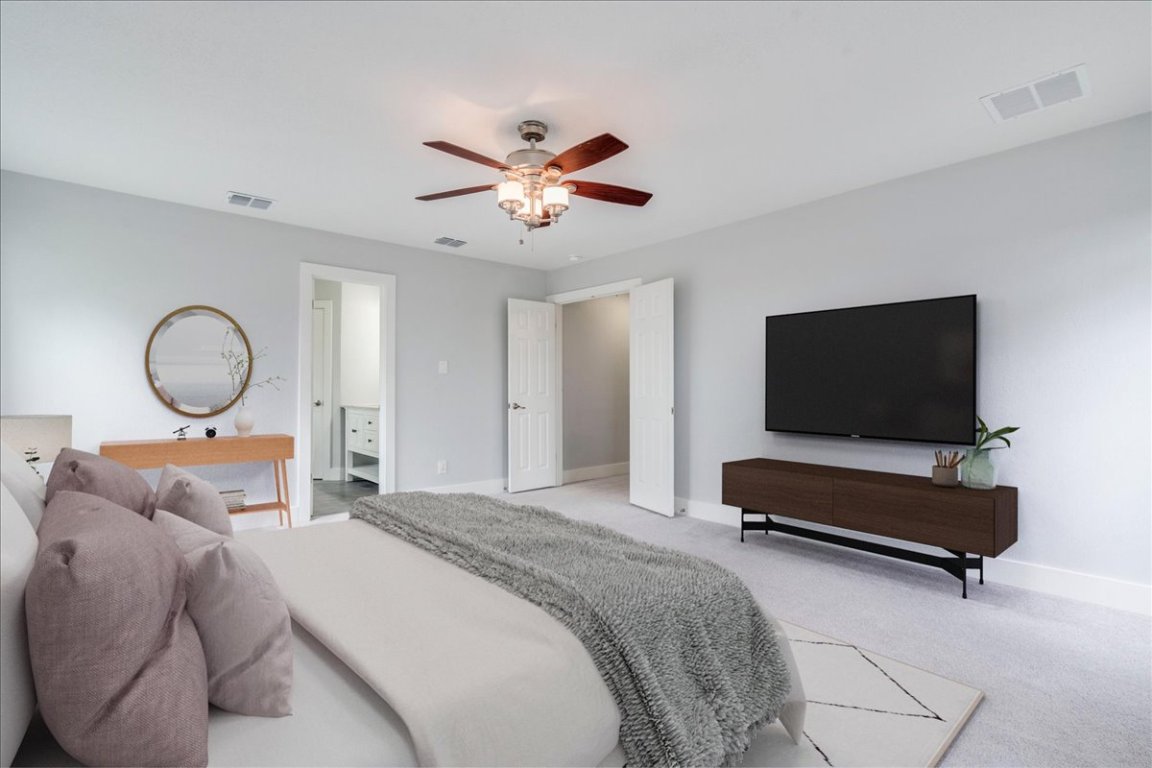 6309 Colina Lane Austin, TX 78759 - Photo 16 of 29 Large primary bedroom with tons of natural light.
