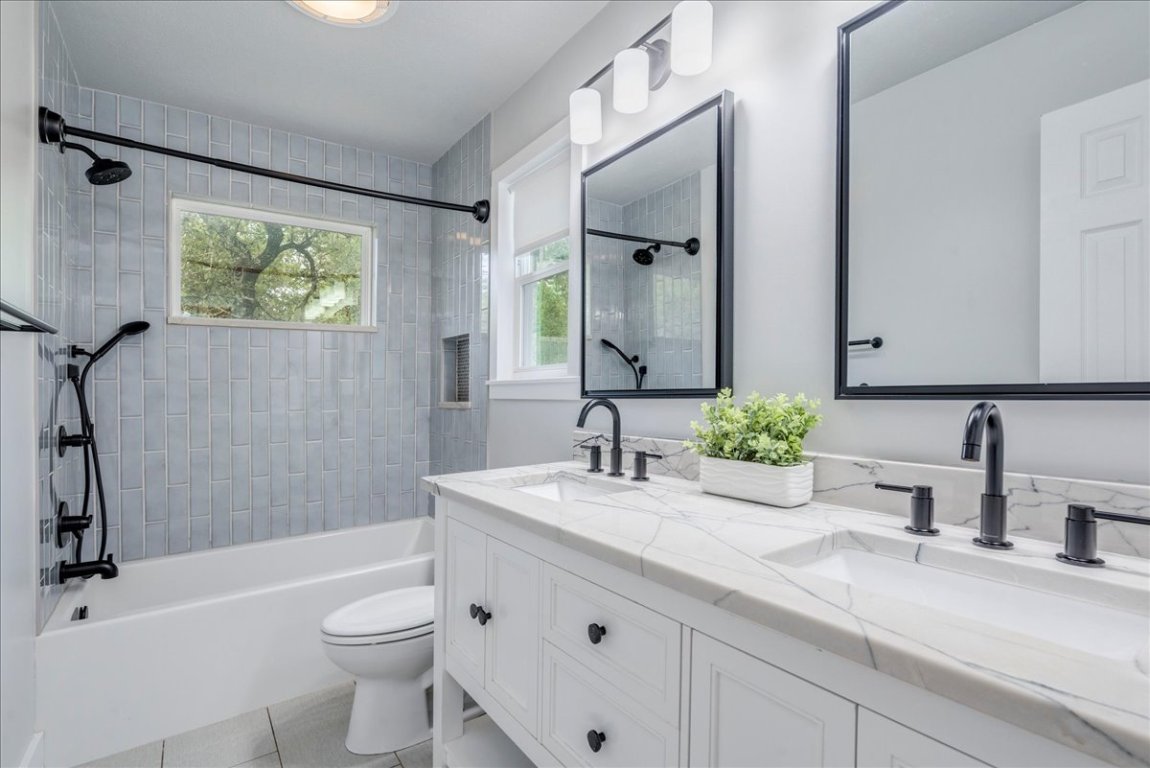 6309 Colina Lane Austin, TX 78759 - Photo 24 of 29 Secondary bathroom with double vanity.