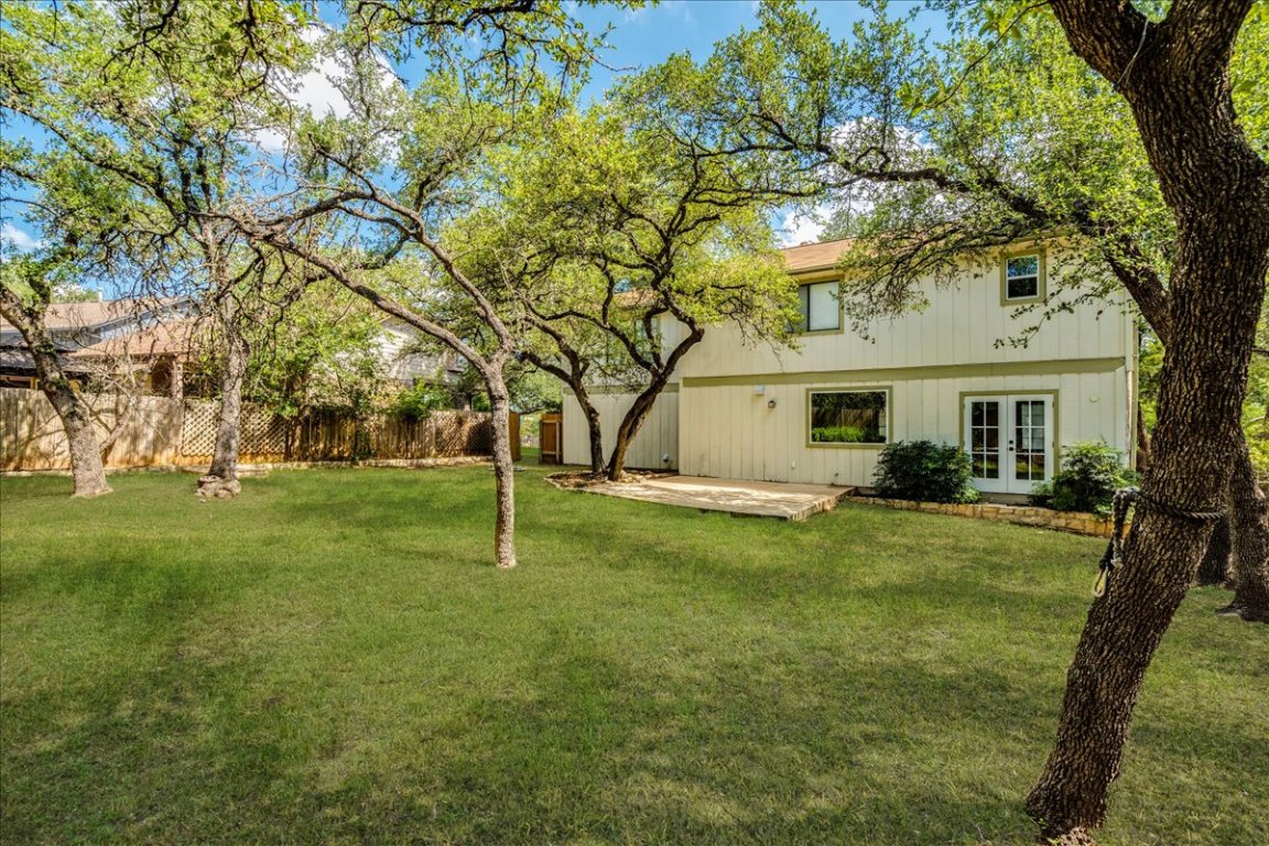 6309 Colina Lane Austin, TX 78759 - Photo 28 of 29 Large, private backyard with oak trees.