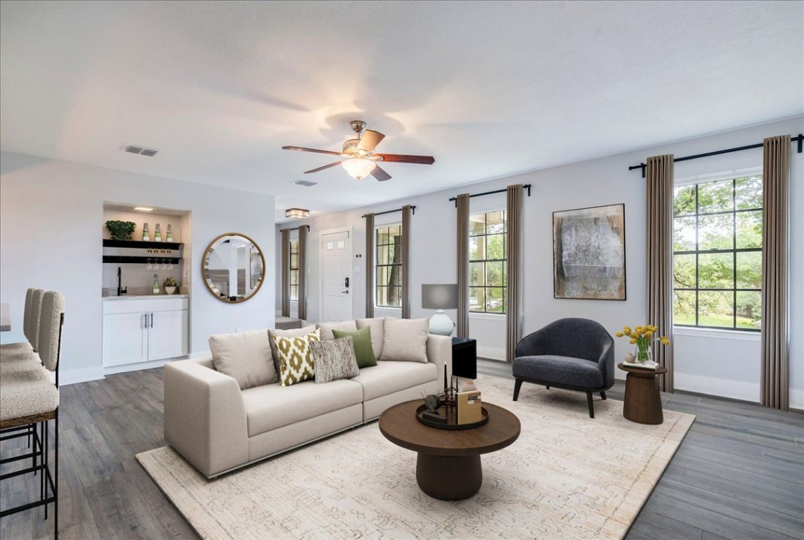 6309 Colina Lane Austin, TX 78759 - Photo 4 of 29 Open living room with built in shelving.