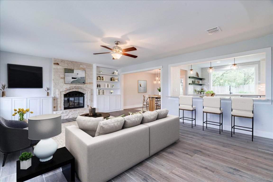 6309 Colina Lane Austin, TX 78759 - Photo 7 of 29 Open living room with built in shelving.
