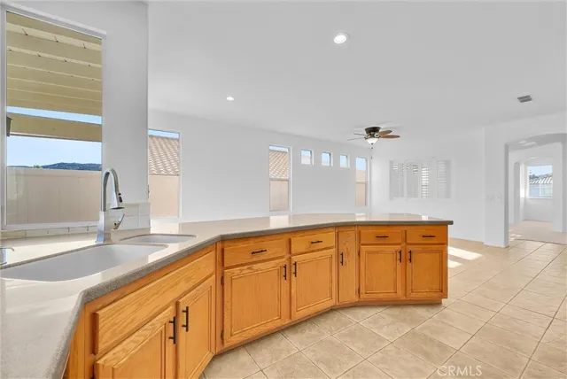 a view of a kitchen with a sink cabinets and a kitchen