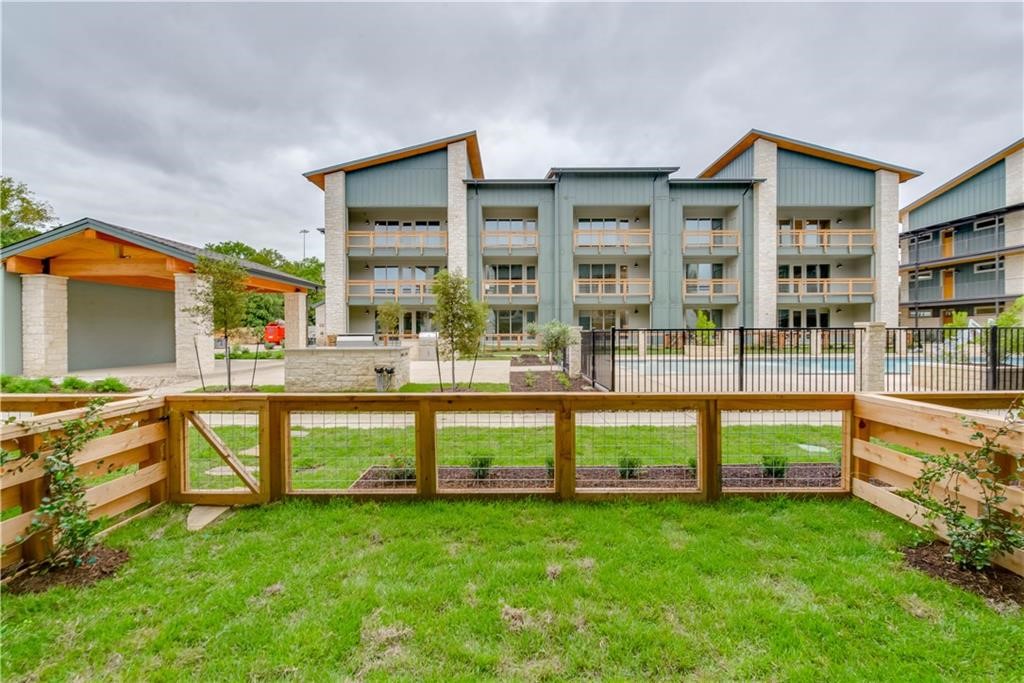 4704 Sunset Trail, Unit 3102 Austin, TX 78745 - Photo 28 of 40 a view of a house with a yard and sitting area