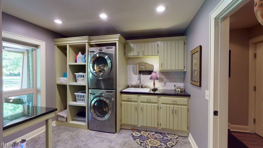 6556 Stone Road Hudson, OH 44236 - Photo 17 of 35 Mud room with laundry and a half bath is conveniently located off the attached 4 car garage entrance