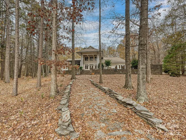 a view of a yard with trees