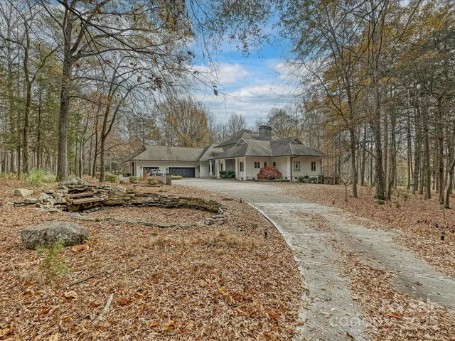 a view of a yard with trees