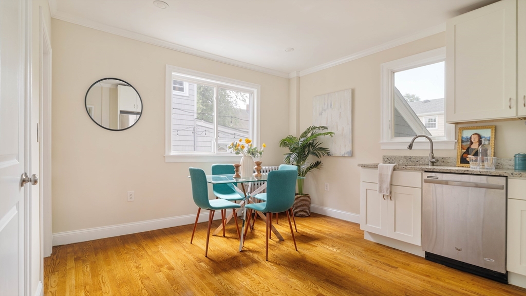 16 Partridge Avenue Somerville, MA 02145 - Photo 14 of 32 a view of a dining room with furniture and a window