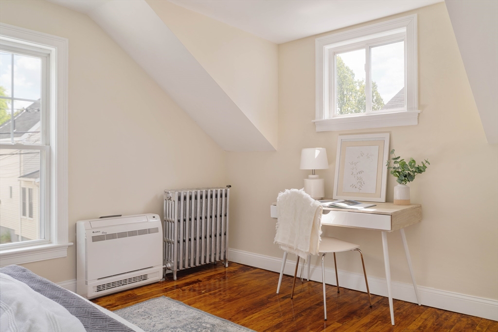 16 Partridge Avenue Somerville, MA 02145 - Photo 19 of 32 a workspace with furniture and a window