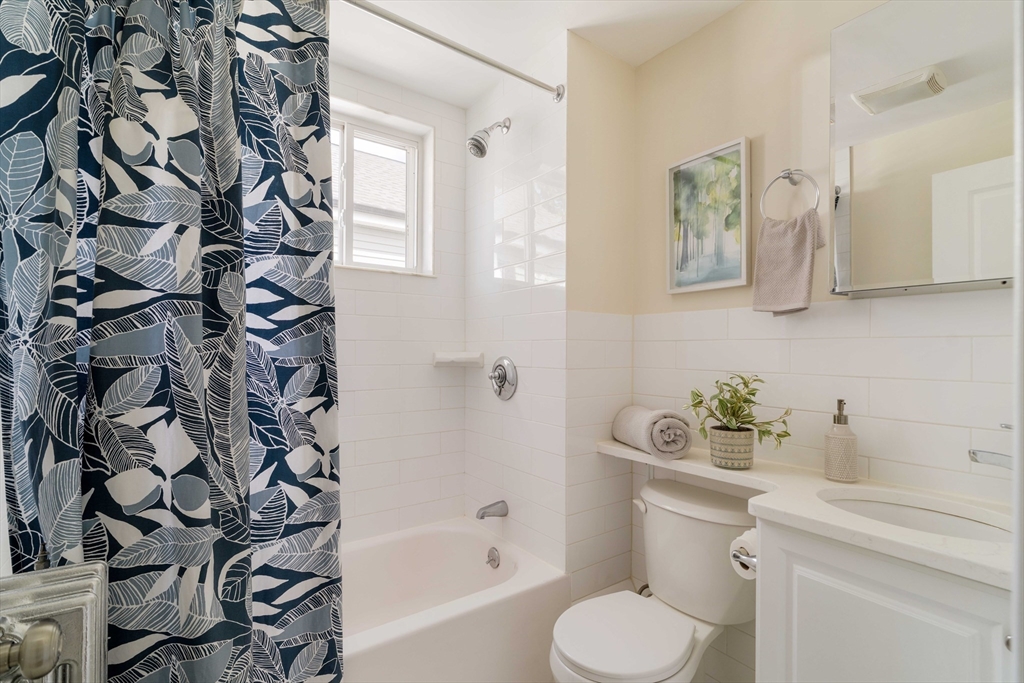 16 Partridge Avenue Somerville, MA 02145 - Photo 20 of 32 a bathroom with a sink toilet and shower
