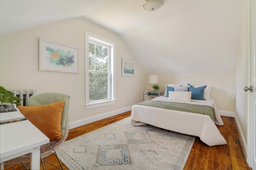 16 Partridge Avenue Somerville, MA 02145 - Photo 22 of 32 a living room with furniture and a window