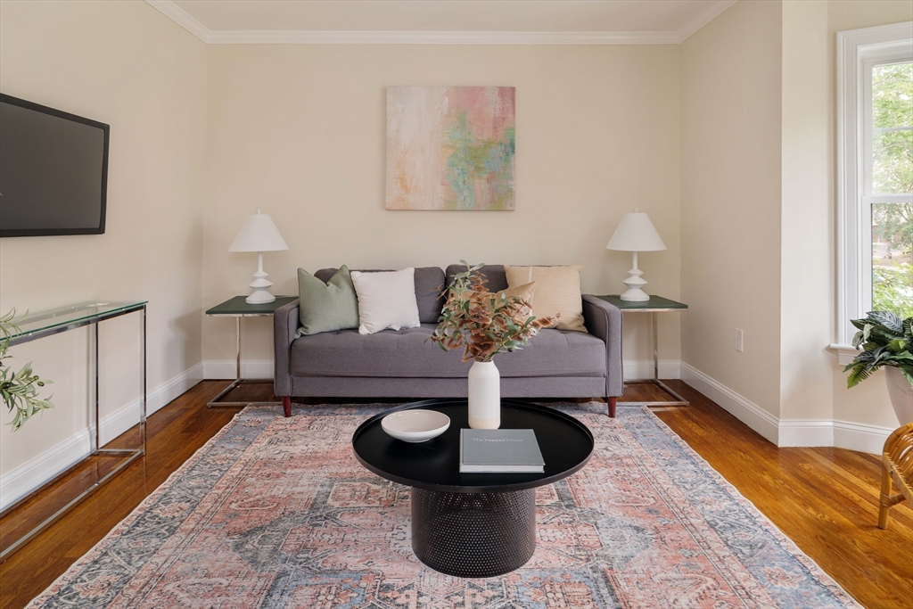 16 Partridge Avenue Somerville, MA 02145 - Photo 3 of 32 a living room with furniture and a flat screen tv