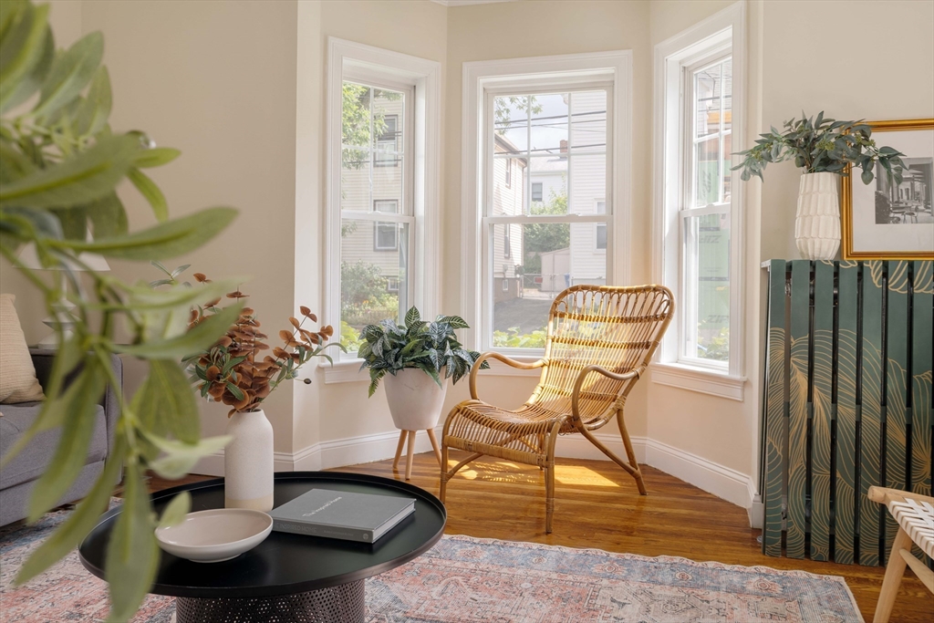 16 Partridge Avenue Somerville, MA 02145 - Photo 5 of 32 a dining room with furniture and wooden floor