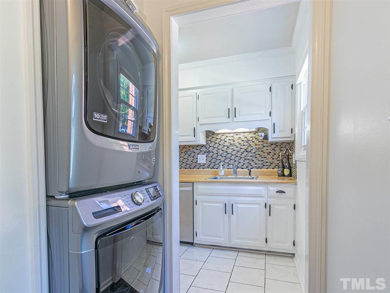 6559 New Market Way Raleigh, NC 27615 - Photo 22 of 25 a room with storage and utility