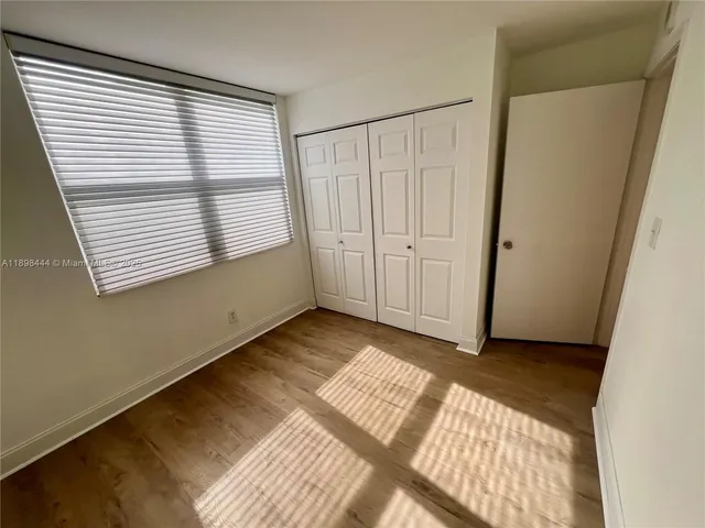 an empty room with closet