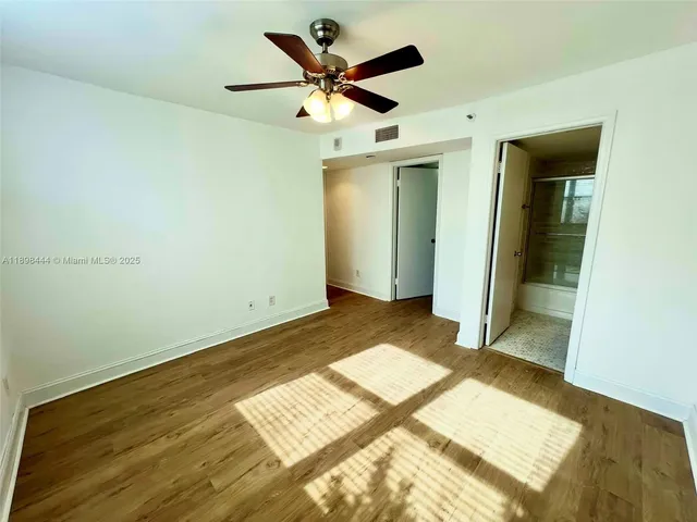 a view of a garden with a bench